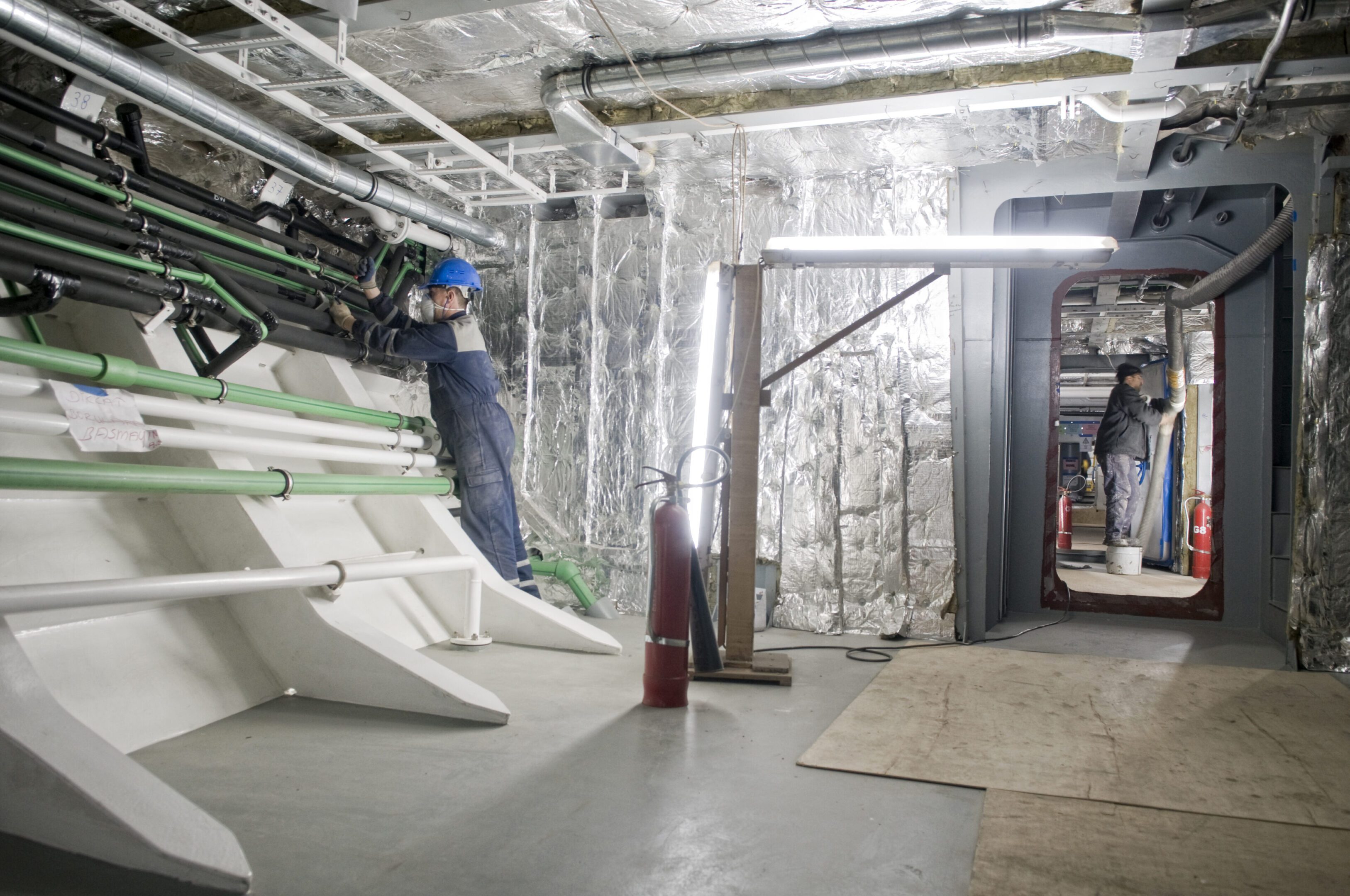 Engineers working in an industrial setting.